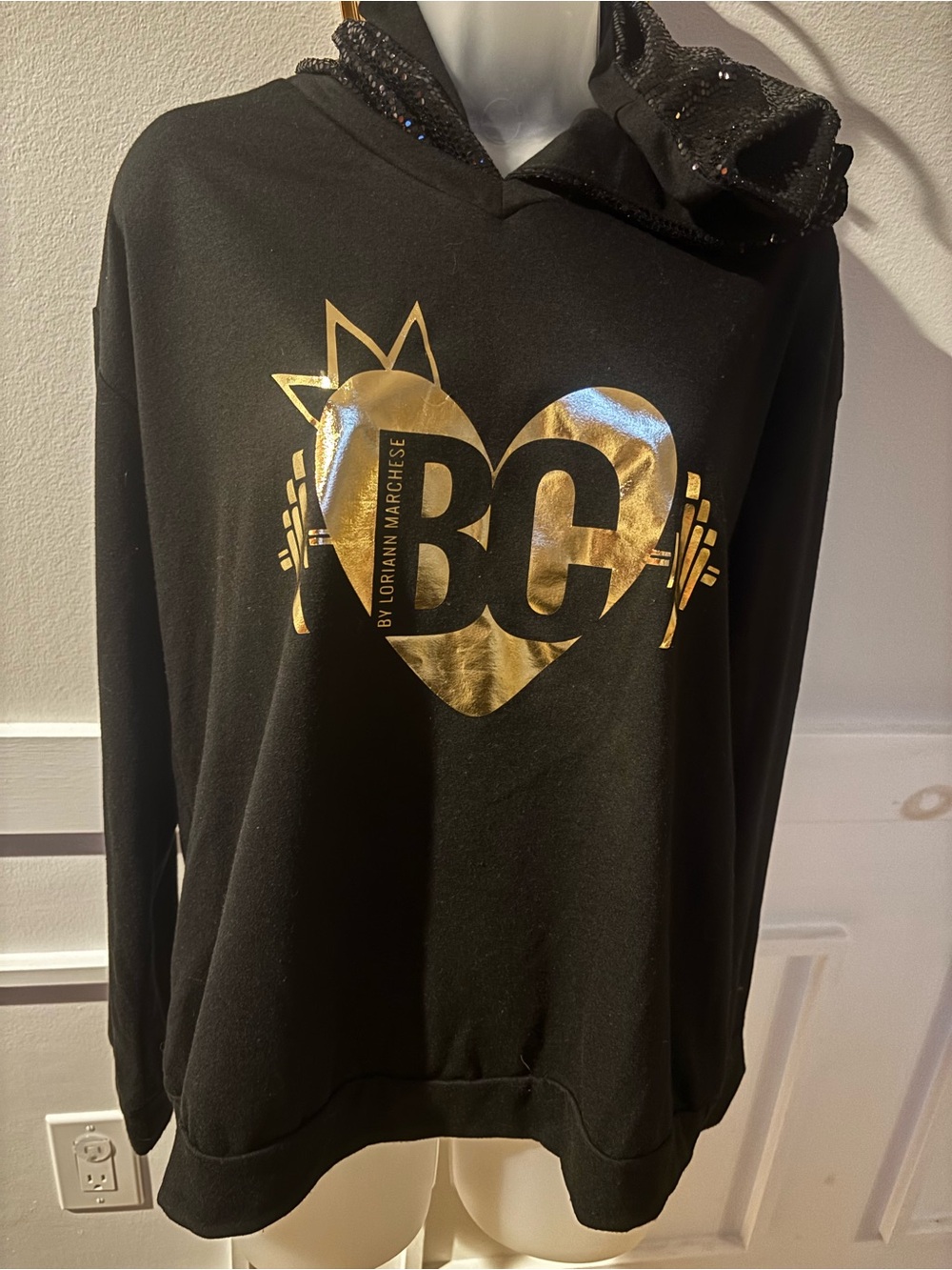 Lori-Ann Marchese, Black Hoodie with Gold Heart Logo . Raine Street . Size large